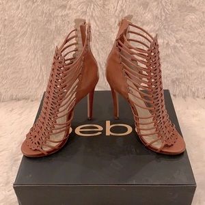 BEBE: Flavia laser cut booties.